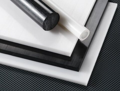 acetal sheets, rods, and tubes stacked in varying colors