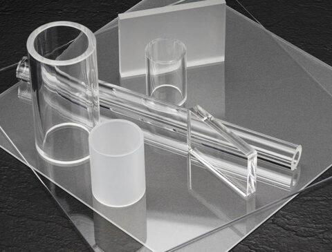 clear acrylic sheets, rods, and tubes stacked