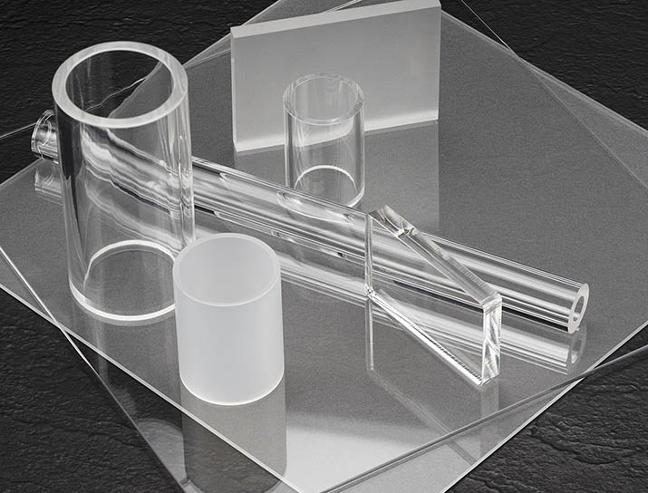 clear acrylic sheets, rods, and tubes stacked