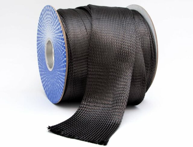 a roll of black carbon braid on a spool
