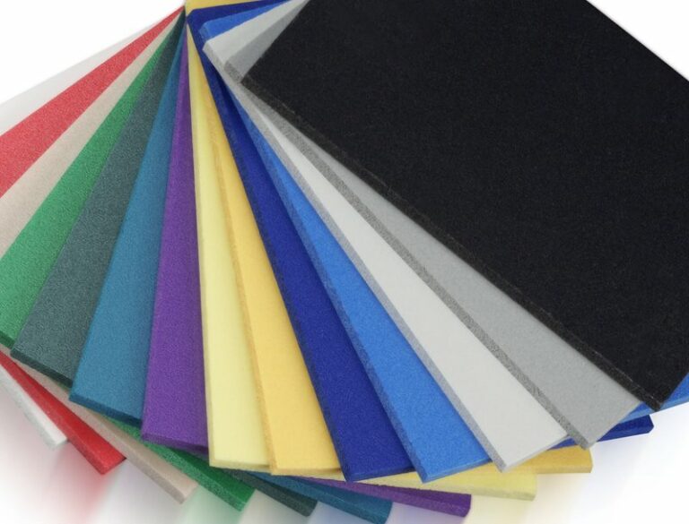 multiple sheets of expanded PVC in various colors stacked and fanned out