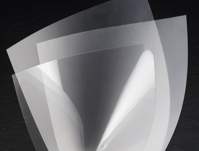 Three sheets of polyester film fanned out