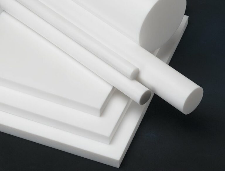 multiple stacked sheets and rods of PTFE in various sizes