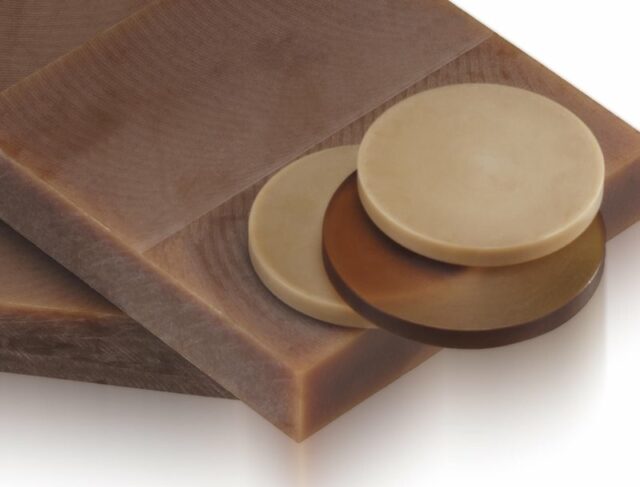 sheets and discs of Ultem® stacked in various colors