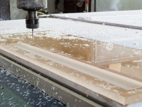 cnc router working on a piece of plastic