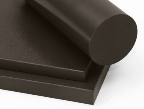 two stacked sheets and a rod of DuPont™ Vespel® Polyimide