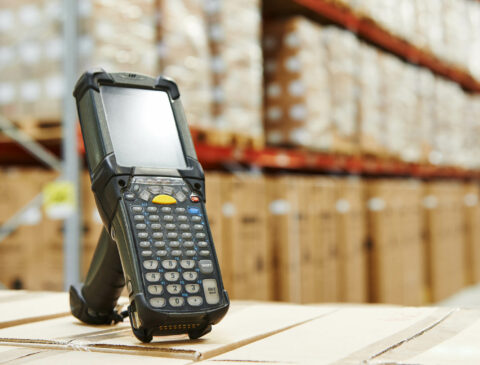 warehouse scene with inventory scanning gun