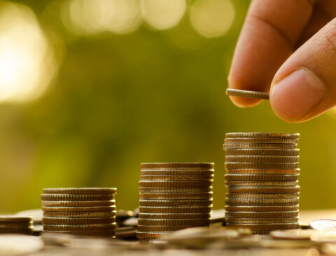 three stacks of coins