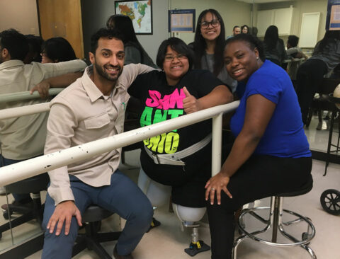 Patient with new definitive prosthetic sockets, and clinicians at ROMP’s US Assistance Program (USAP) clinic in San Antonio, Texas