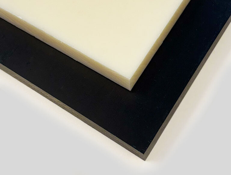Group of smooth-finished ABS plastic sheets in various colors, including white, black, and natural, stacked and fanned out on a white background.